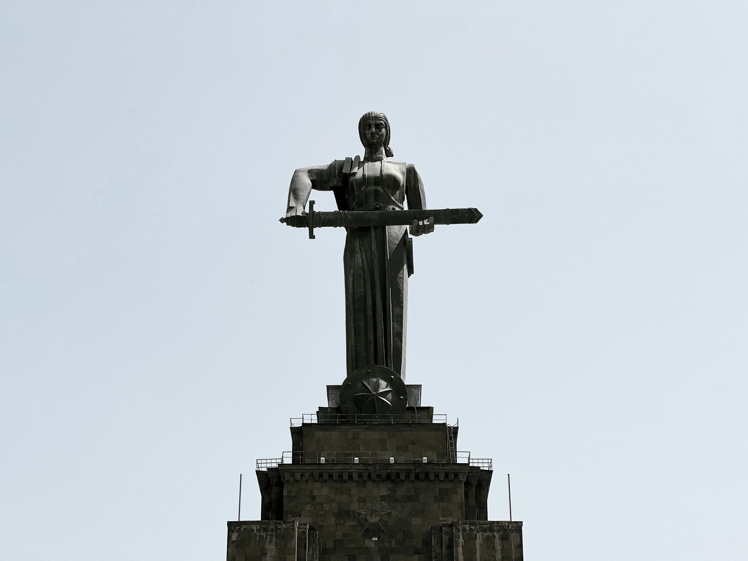 Majestic view of the iconic Mother Armenia statue in clear skies of Yerevan.