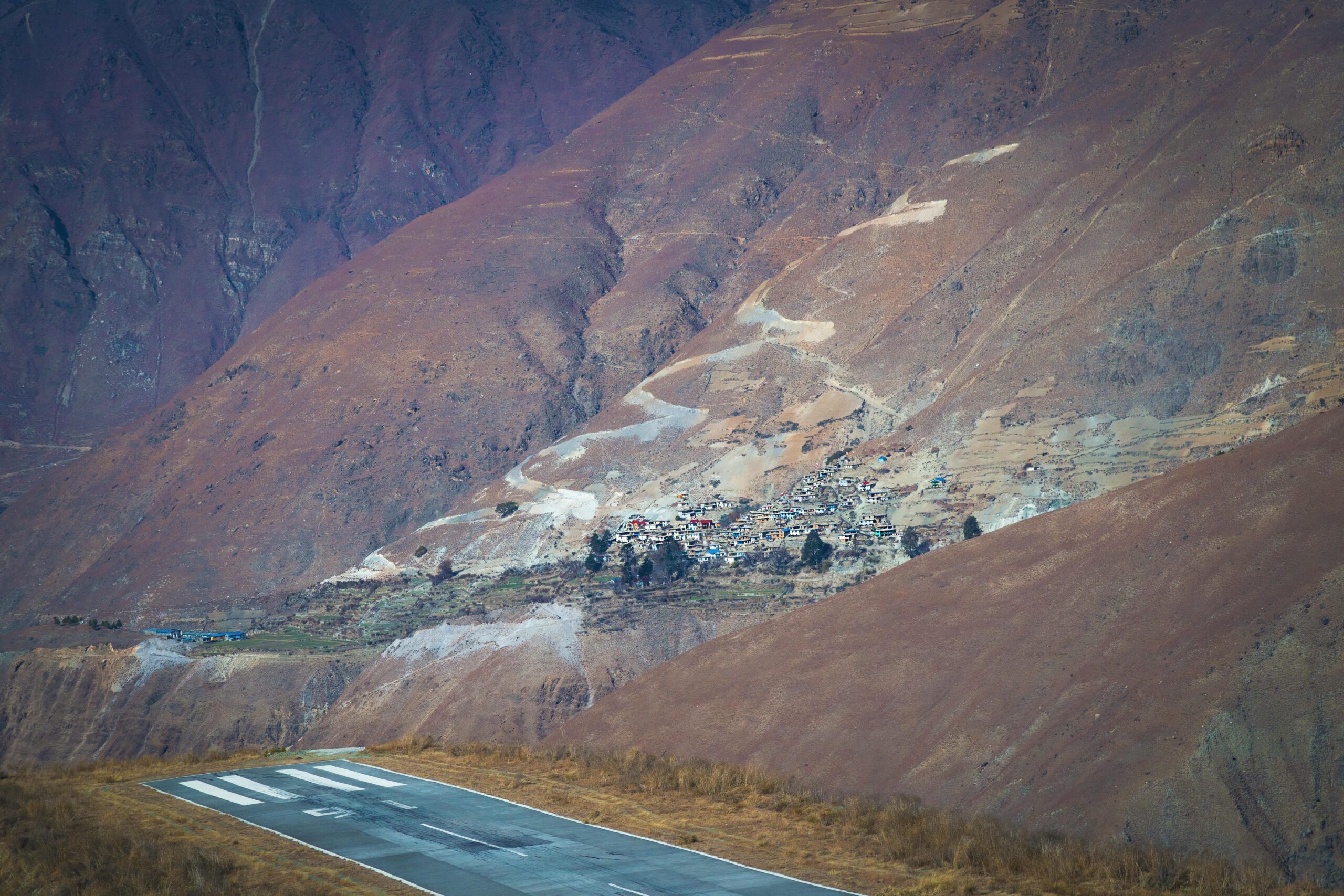 Scenic mountain village near a landing strip in Karnali Province, Nepal.