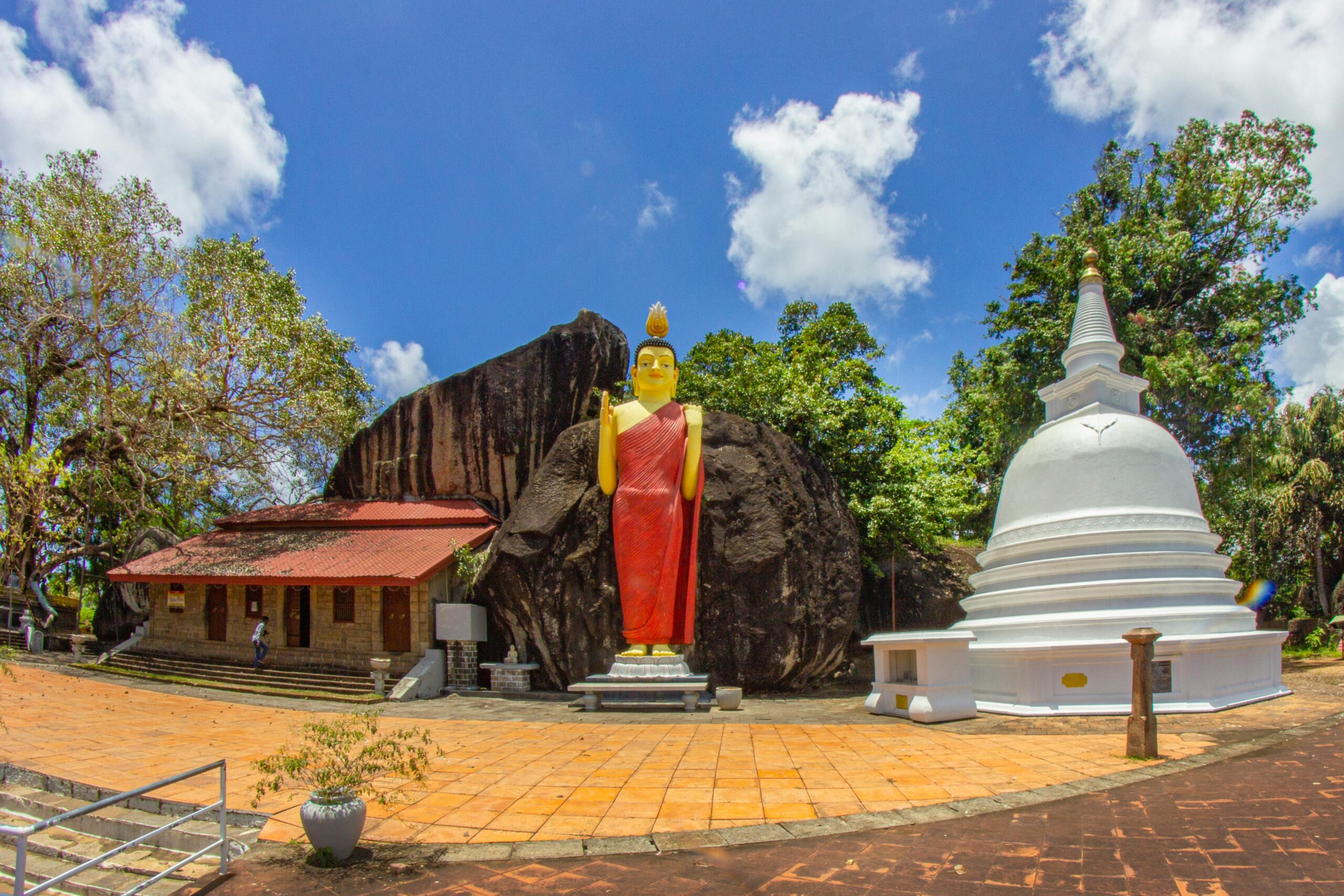 Buddhist temple with giant Buddha statue in Unawatuna, Southern Sri Lanka, a popular spiritual site.