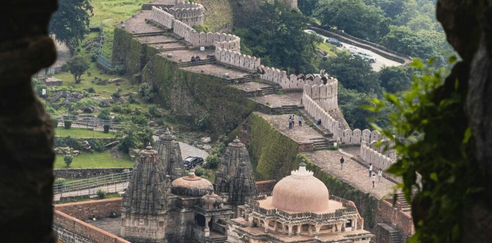 Capture the grandeur of Udaipur's ancient architecture through this breathtaking perspective from Kumbhalgarh Fort, Rajasthan.