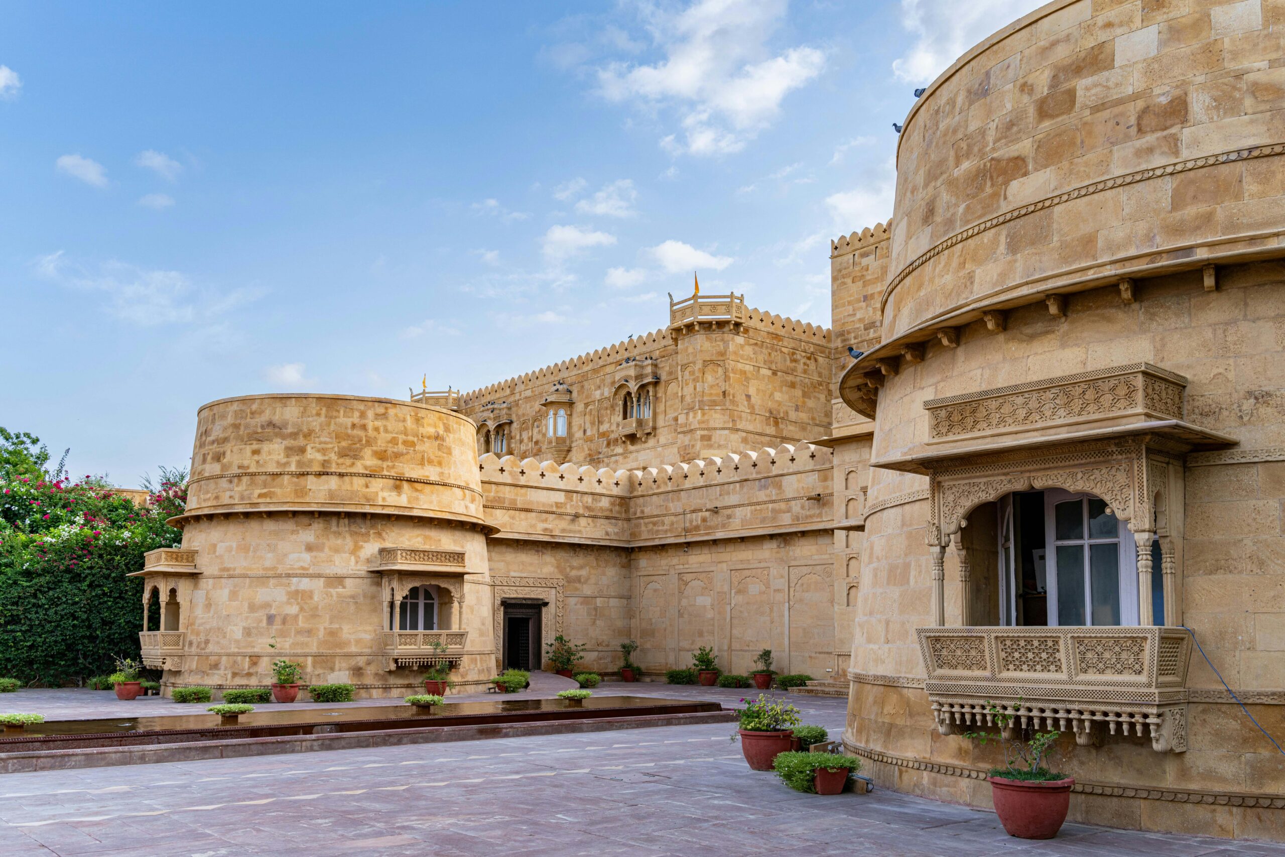 Elegant sandstone architecture of a heritage palace in Jaisalmer, Rajasthan, India.