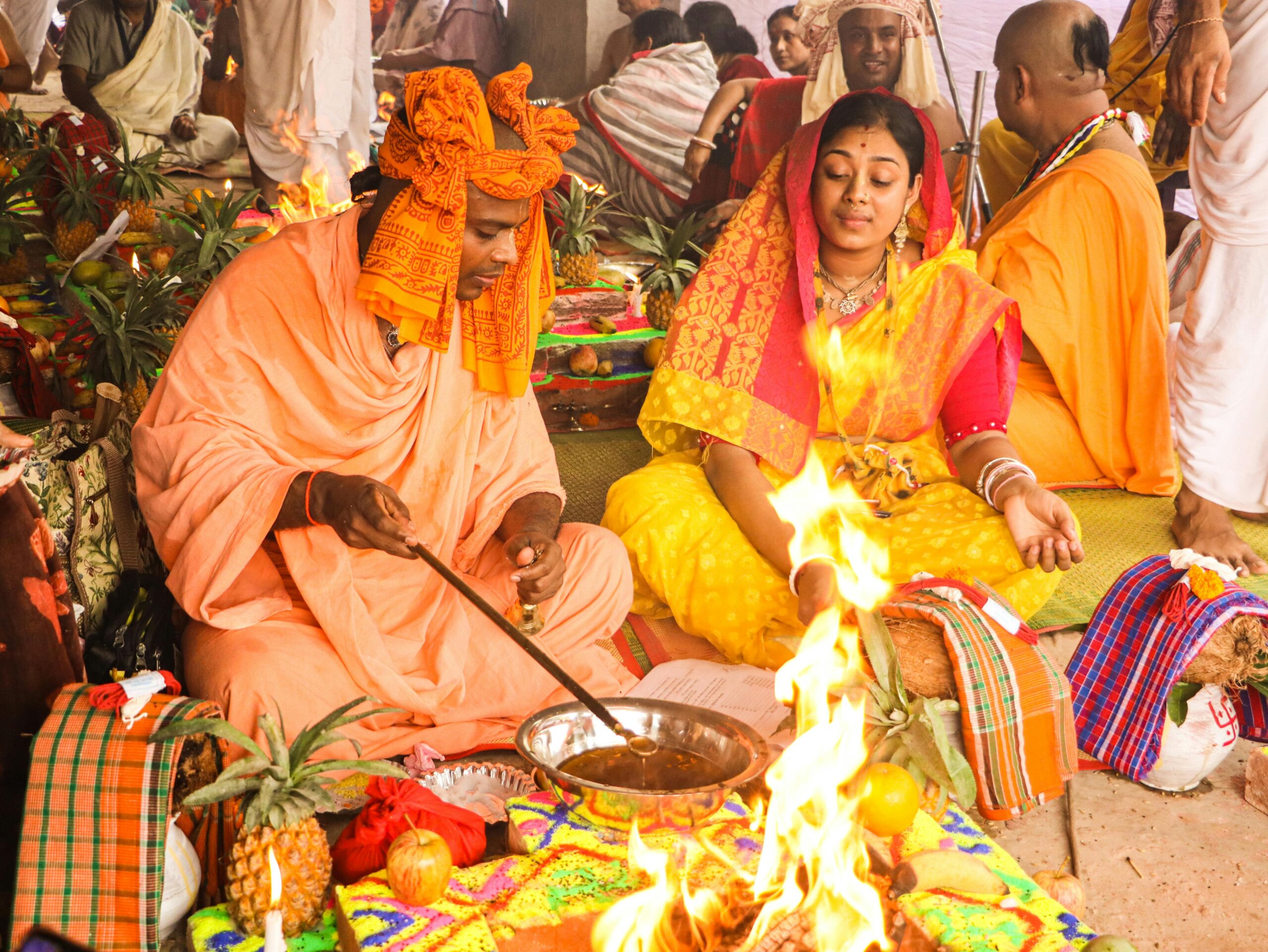 Vibrant Bengali Hindu wedding ceremony with sacred fire ritual in Dhaka, Bangladesh.