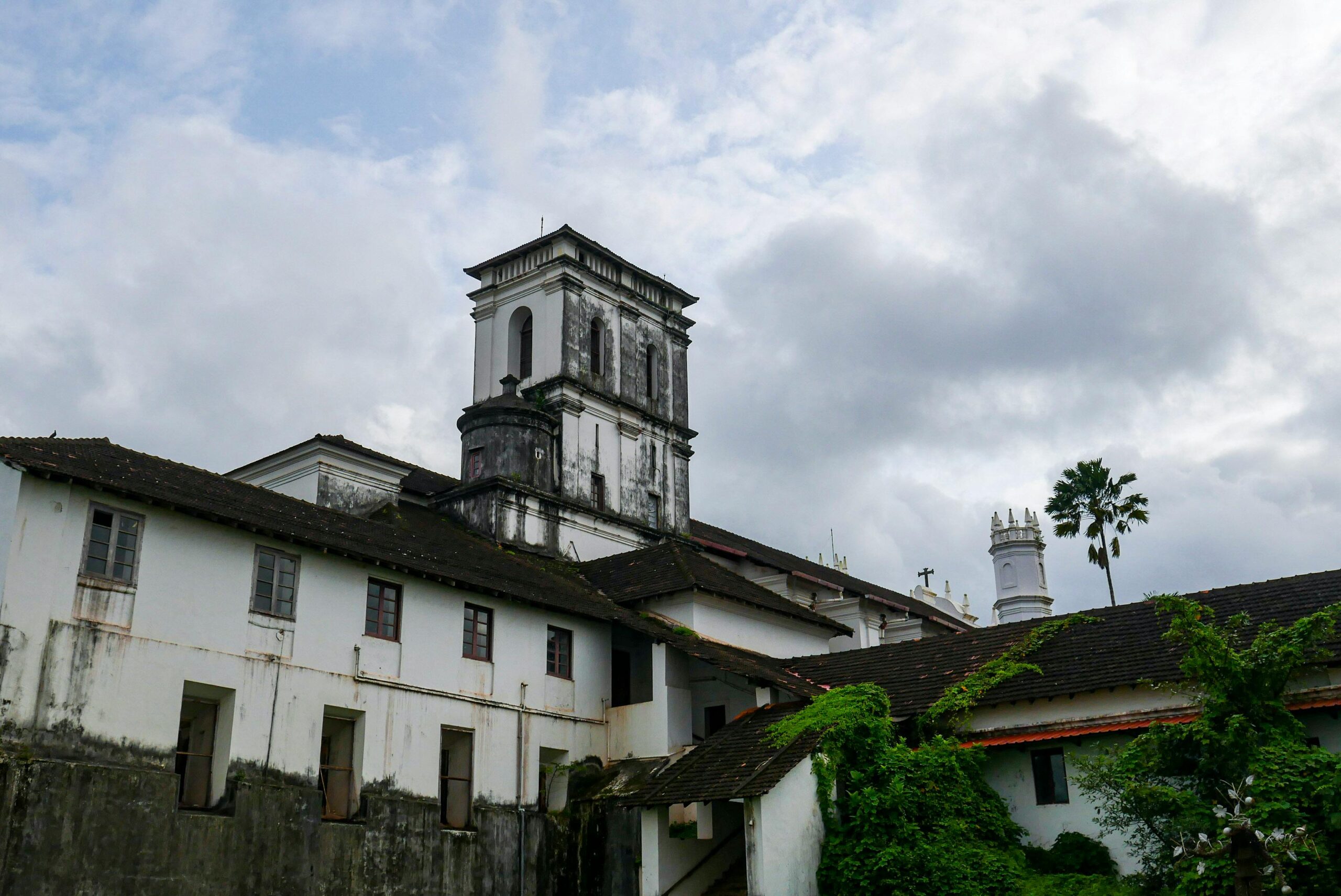 View of a historical church building in Goa, India, showcasing colonial architecture.
