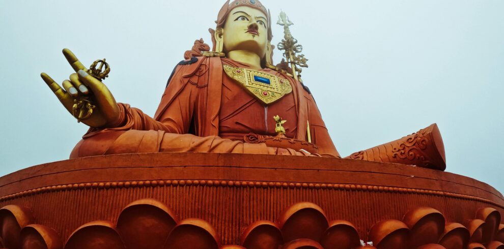 Towering Guru Padmasambhava statue in Namchi, Sikkim, showcasing profound spirituality and intricate artistry.