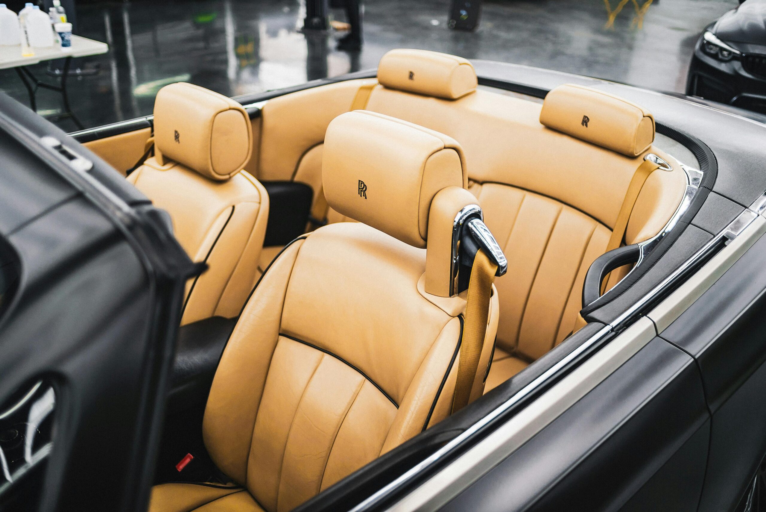 Explore the exquisite tan leather seats of an upscale convertible for ultimate comfort and style.