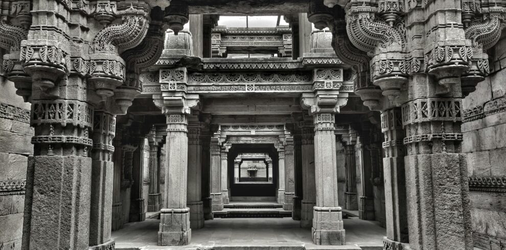 Intricate stone carvings of Adalaj Stepwell, showcasing Indian heritage architecture.
